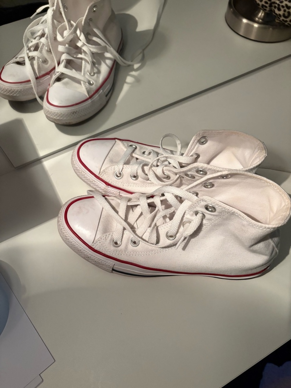 Converse White High-Top Canvas Sneakers with Red Sole Accent
